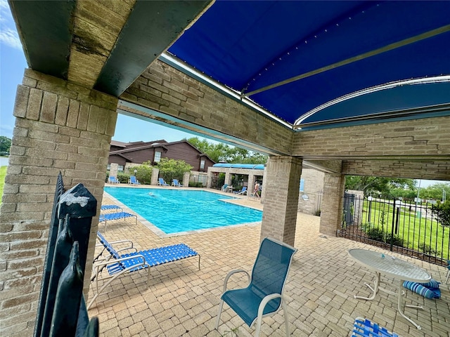 2611 Grants Lake Blvd Unit 237, Sugar Land, TX 77479 - community pool with fence and a patio