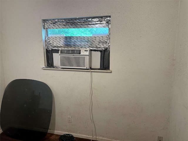 7722 Claiborne St, Houston, TX 77016 - detailed view of cooling unit and baseboards
