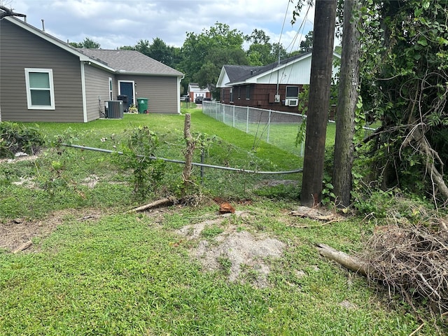7722 Claiborne St, Houston, TX 77016 - view of yard featuring cooling unit and fence