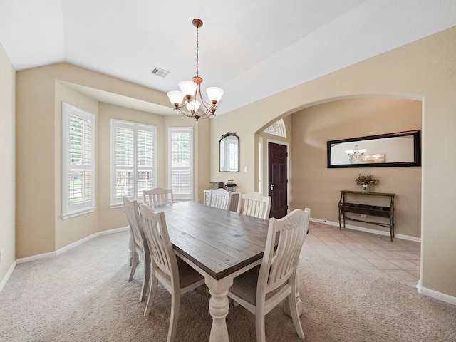 29954 Spring Creek Ln, Brookshire, TX 77423 - dining space with a chandelier, light carpet, arched walkways, lofted ceiling, and baseboards