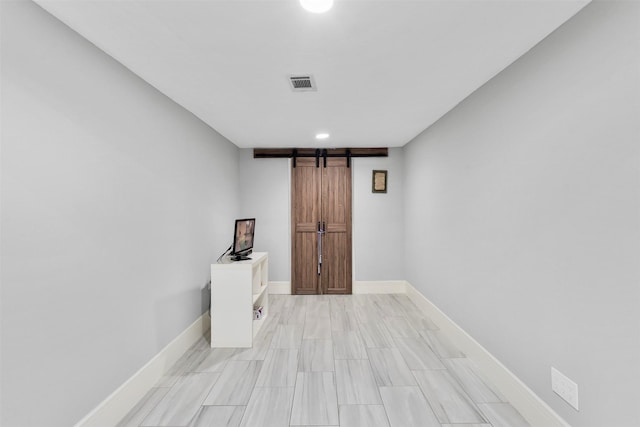 7727 Barberton Dr, Houston, TX 77036 - empty room with a barn door and baseboards