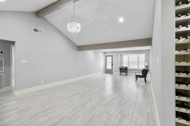 7727 Barberton Dr, Houston, TX 77036 - unfurnished living room featuring high vaulted ceiling, beamed ceiling, a chandelier, baseboards, and recessed lighting