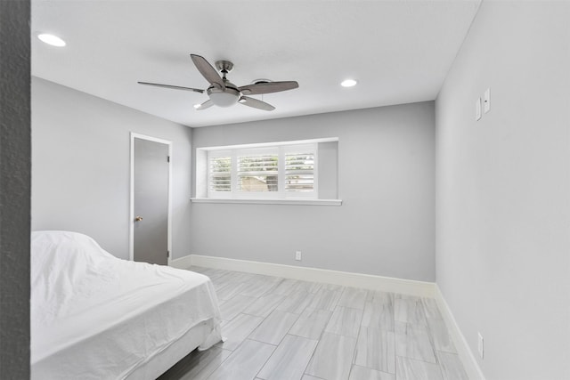 7727 Barberton Dr, Houston, TX 77036 - bedroom with recessed lighting, baseboards, and a ceiling fan