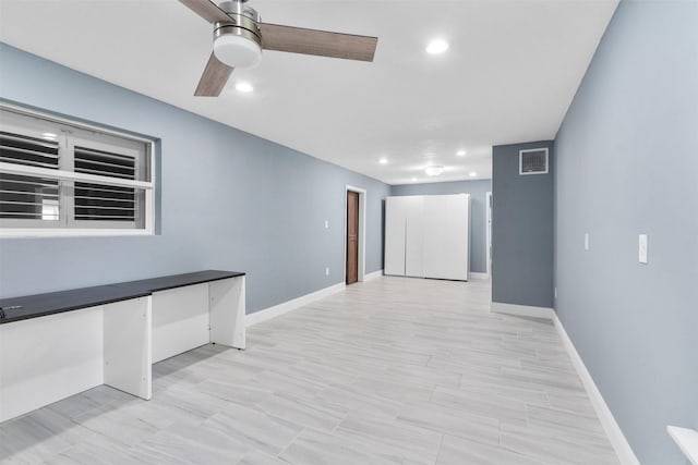 7727 Barberton Dr, Houston, TX 77036 - spare room with ceiling fan, recessed lighting, and baseboards