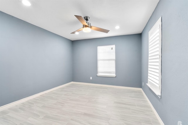 7727 Barberton Dr, Houston, TX 77036 - spare room featuring a ceiling fan, plenty of natural light, baseboards, and recessed lighting