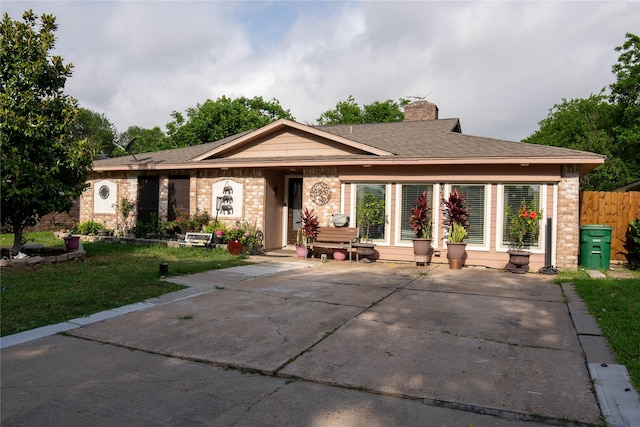 6238 Westwick Dr, Houston, TX 77072 - ranch-style house featuring a chimney, brick siding, and roof with shingles