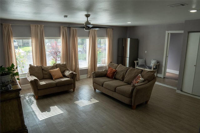 6238 Westwick Dr, Houston, TX 77072 - living room featuring light wood-style flooring, baseboards, and recessed lighting