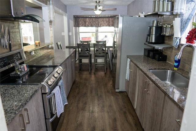 6238 Westwick Dr, Houston, TX 77072 - kitchen with stainless steel appliances, island exhaust hood, a sink, dark wood-style floors, and ceiling fan