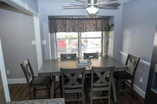 6238 Westwick Dr, Houston, TX 77072 - dining area with wood finished floors, ceiling fan, and baseboards