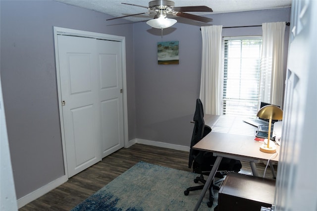 6238 Westwick Dr, Houston, TX 77072 - home office with dark wood-type flooring, ceiling fan, and baseboards