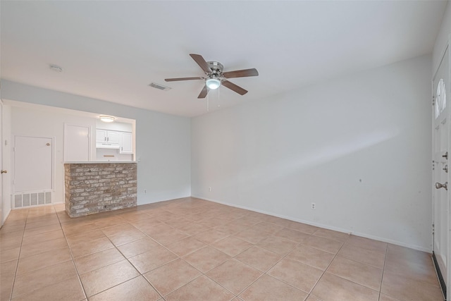 811 Wax Myrtle Ln Unit A, Houston, TX 77079 - unfurnished room featuring a ceiling fan, light tile patterned floors, and a smoke detector