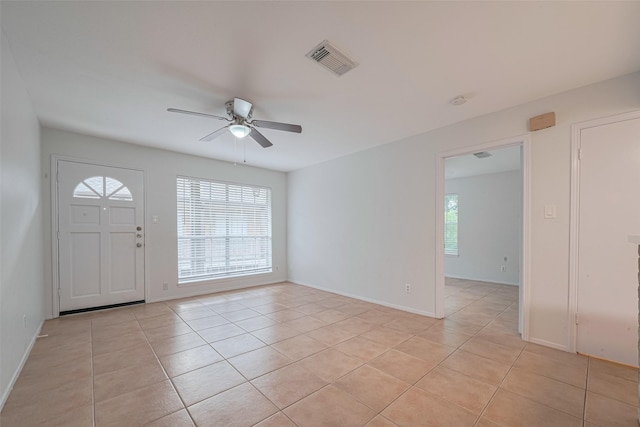 811 Wax Myrtle Ln Unit A, Houston, TX 77079 - entrance foyer with a ceiling fan, light tile patterned floors, and baseboards