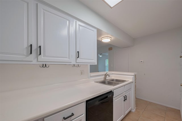 811 Wax Myrtle Ln Unit A, Houston, TX 77079 - kitchen featuring dishwasher, a sink, white cabinets, light tile patterned floors, and light countertops