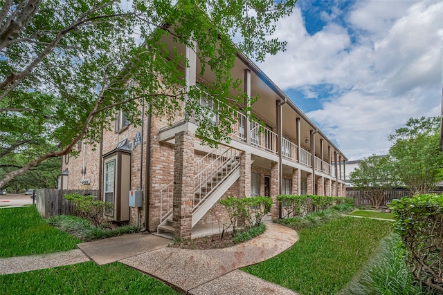 811 Wax Myrtle Ln Unit A, Houston, TX 77079 - view of building exterior with stairs