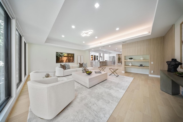 2135 Quenby St, Houston, TX 77005 - living area featuring a raised ceiling, healthy amount of natural light, light wood finished floors, and recessed lighting