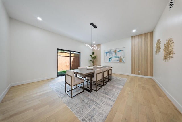 2135 Quenby St, Houston, TX 77005 - dining space with light wood finished floors, baseboards, and recessed lighting