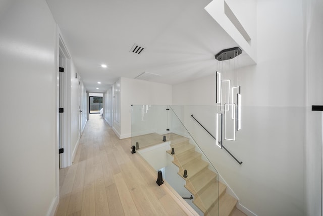 2135 Quenby St, Houston, TX 77005 - hallway featuring light wood-style flooring, baseboards, and recessed lighting
