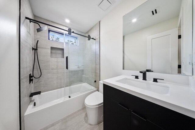 2135 Quenby St, Houston, TX 77005 - full bath with toilet, vanity, and combined bath / shower with glass door