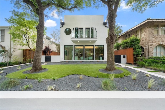 2135 Quenby St, Houston, TX 77005 - back of house featuring a balcony and stucco siding