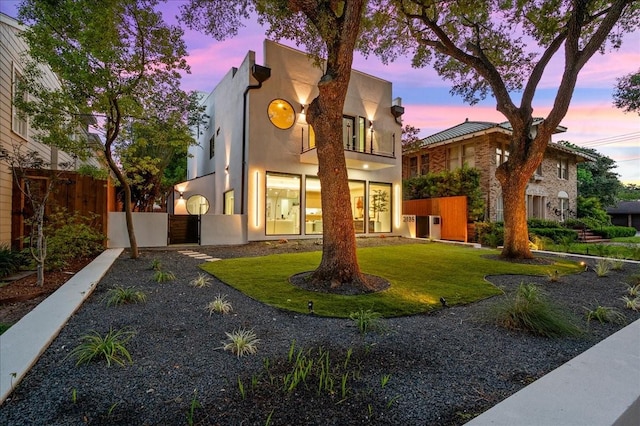 2135 Quenby St, Houston, TX 77005 - view of front of property featuring a balcony and stucco siding