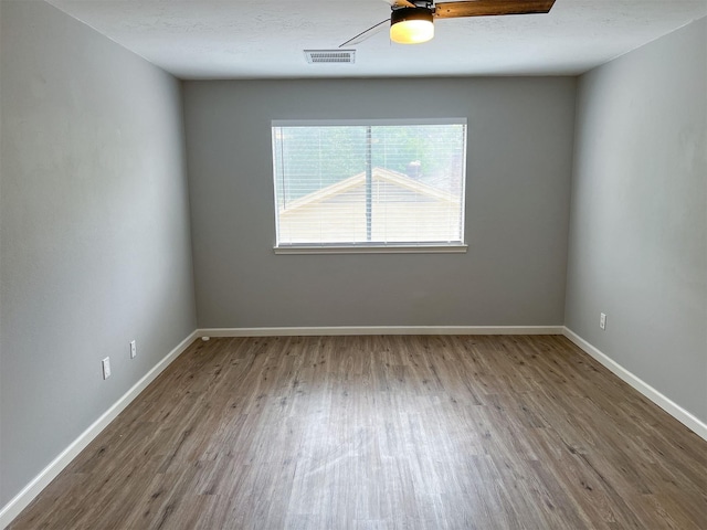 6019 Lawn Ln, Houston, TX 77088 - unfurnished room with wood finished floors and baseboards