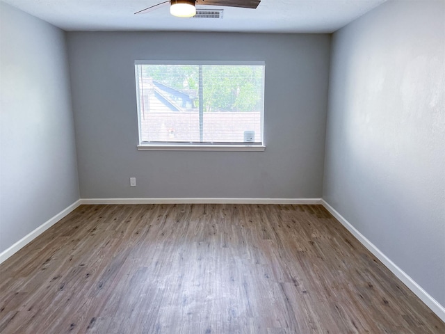 6019 Lawn Ln, Houston, TX 77088 - spare room with wood finished floors and a ceiling fan