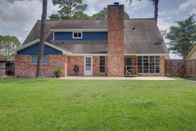 6019 Lawn Ln, Houston, TX 77088 - back of house with a patio area, roof with shingles, brick siding, a chimney, and a gate