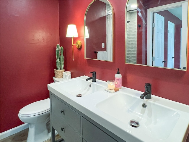 6019 Lawn Ln, Houston, TX 77088 - bathroom with toilet and double vanity
