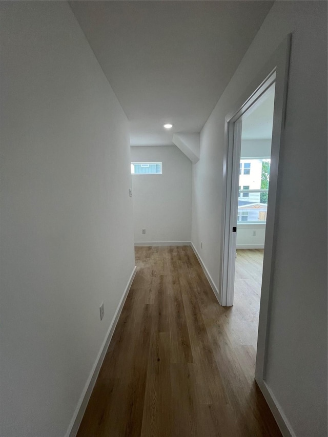 8605 Wileyvale Rd, Houston, TX 77016 - hallway featuring wood finished floors and baseboards