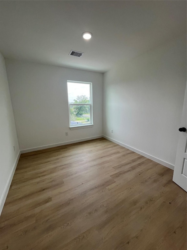 8605 Wileyvale Rd, Houston, TX 77016 - spare room featuring light wood-type flooring and baseboards