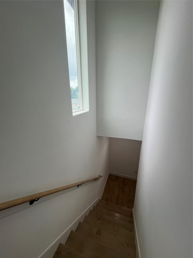 8605 Wileyvale Rd, Houston, TX 77016 - staircase with wood finished floors and baseboards