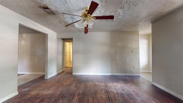 4618 Mallow St, Houston, TX 77051 - spare room with ceiling fan, hardwood / wood-style flooring, a textured ceiling, and baseboards