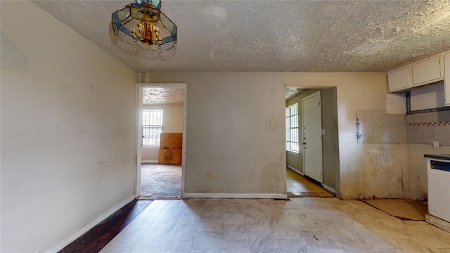 4618 Mallow St, Houston, TX 77051 - unfurnished dining area with plenty of natural light and baseboards
