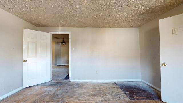 4618 Mallow St, Houston, TX 77051 - unfurnished room with baseboards and a textured ceiling