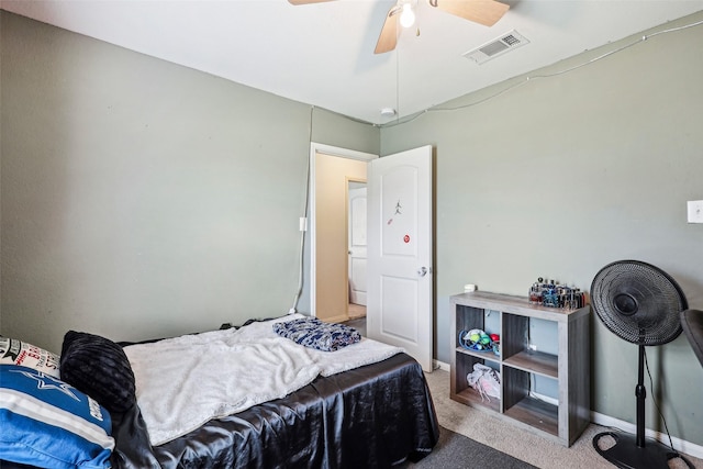 6138 Hidden Cove Rd, Baytown, TX 77523 - bedroom with carpet floors, baseboards, and ceiling fan