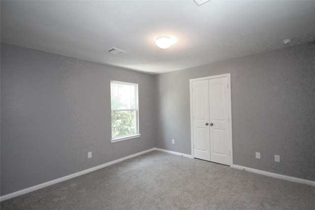 16946 W Lynbrook, Montgomery, TX 77316 - unfurnished room featuring carpet floors, baseboards, and a smoke detector