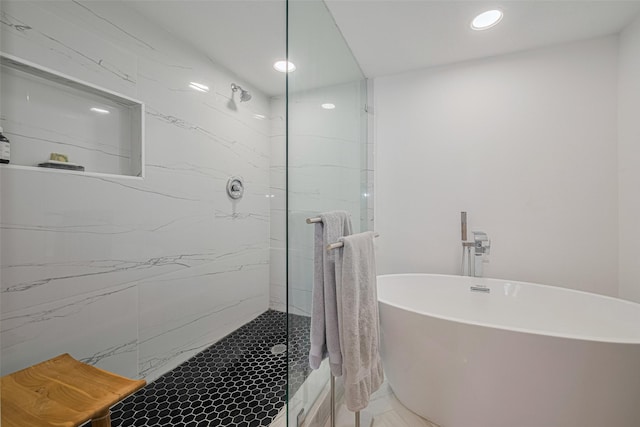 3663 Nasa Pkwy Unit 601, Seabrook, TX 77586 - bathroom with a marble finish shower, recessed lighting, and a soaking tub