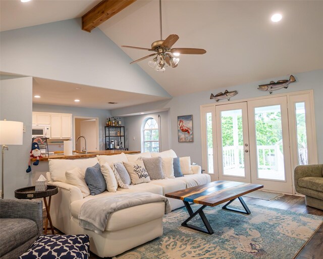 383 County Road 296, Sargent, TX 77414 - living room with beam ceiling, ceiling fan, wood finished floors, high vaulted ceiling, and recessed lighting