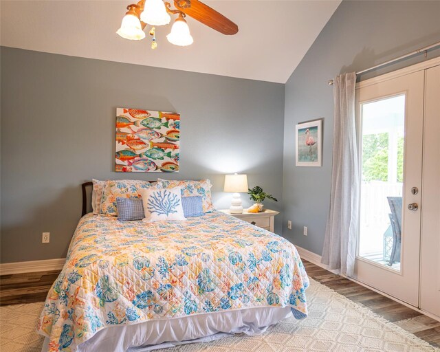 383 County Road 296, Sargent, TX 77414 - bedroom with lofted ceiling, wood finished floors, access to exterior, baseboards, and a ceiling fan
