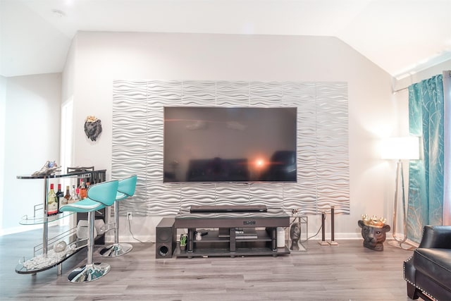 5515 E Terrace Gable Cir, Katy, TX 77494 - living area with vaulted ceiling, wood finished floors, and baseboards