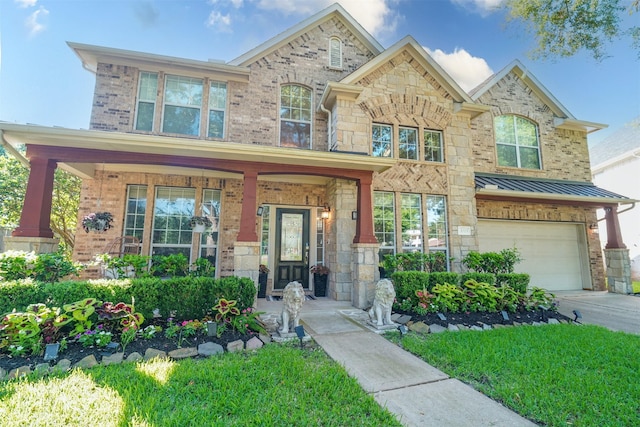 5515 E Terrace Gable Cir, Katy, TX 77494 - view of front facade with an attached garage, covered porch, brick siding, and concrete driveway