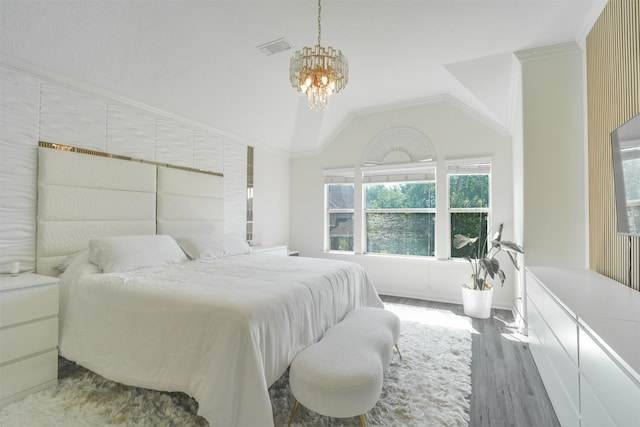 5515 E Terrace Gable Cir, Katy, TX 77494 - bedroom featuring a chandelier, wood finished floors, and lofted ceiling