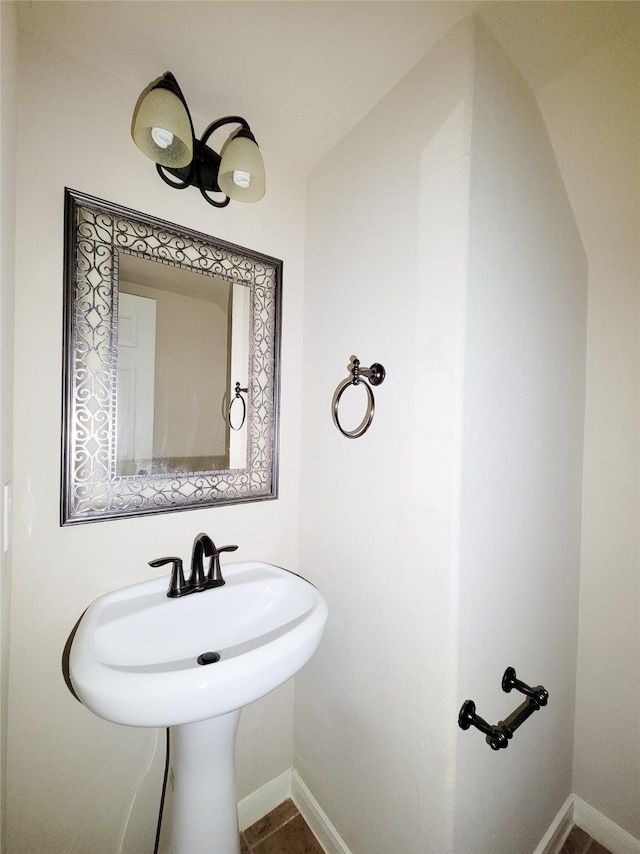 bathroom with baseboards