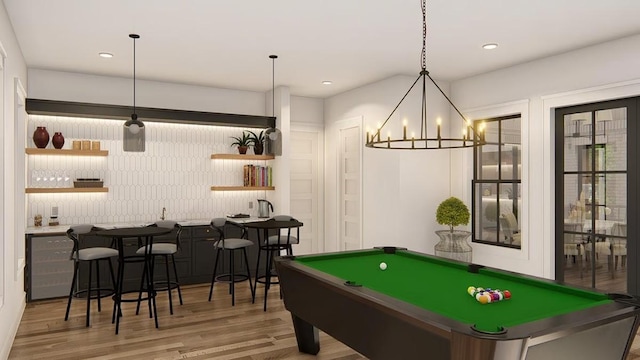 16627 Kelton, Iola, TX 77861 - game room with wood finished floors, pool table, and a chandelier