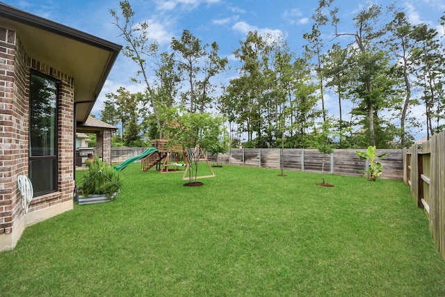 17355 Camillia Trl, Conroe, TX 77302 - view of yard with a playground