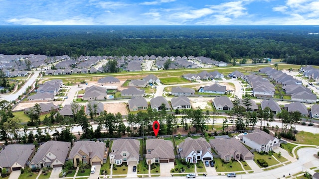 17355 Camillia Trl, Conroe, TX 77302 - aerial view of property's location featuring a heavily wooded area and nearby suburban area