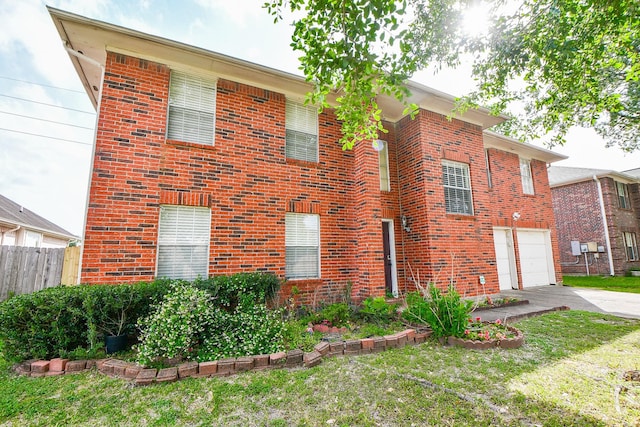 16023 Mission Glen Dr, Houston, TX 77083 - view of front of house featuring concrete driveway, an attached garage, and brick siding