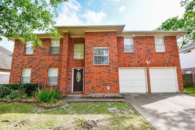16023 Mission Glen Dr, Houston, TX 77083 - view of front of home featuring driveway, an attached garage, and brick siding