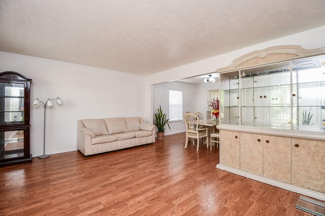 16023 Mission Glen Dr, Houston, TX 77083 - living room with light wood-type flooring and baseboards