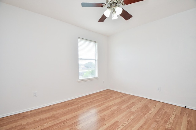 16023 Mission Glen Dr, Houston, TX 77083 - unfurnished room featuring light wood-type flooring, baseboards, and a ceiling fan